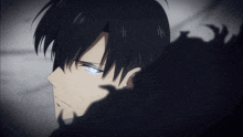 a close up of a man 's face with a shadow behind him