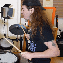Drumming Bradley Hall GIF - Drumming Bradley Hall Beating The Drums GIFs