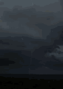 a lightning bolt strikes the ground with the words " fuck you " below it