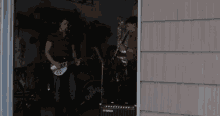 Welcome To The Dollhouse Guitar In Garage GIF - Welcome To The Dollhouse Guitar In Garage GIFs
