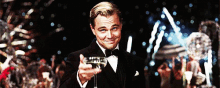 How Can You Not Fall In Love With Him GIF - The Great Gatsby Leonardo Di Caprio Cheers GIFs