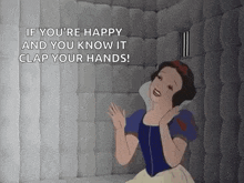 snow white is sitting in a cell in a jail cell with a prison cell door behind her .