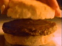 Mcdonalds Sausage Biscuit Breakfast Sandwich GIF - Mcdonalds Sausage Biscuit Breakfast Sandwich Fast Food GIFs