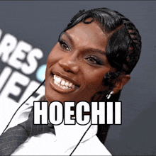 a picture of a woman with the word hoechii written on it