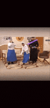 two nuns singing into microphones in a living room