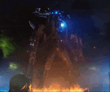 a robot with a blue light on its head is standing in front of a fire