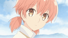 a close up of a girl 's face with pink hair