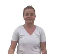 a woman wearing a white shirt is making a hand gesture