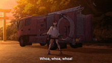 a girl standing in front of a fire truck with the words whoa whoa whoa written below her
