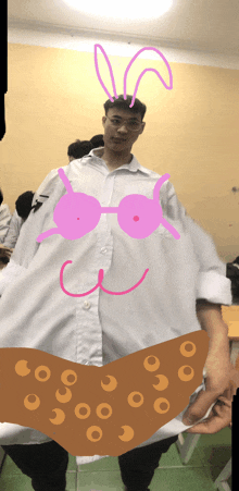 a man in a white shirt has a drawing of a bunny on his shirt