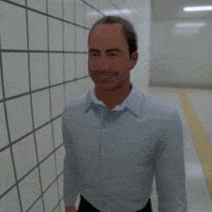 a man in a blue shirt and black pants is standing in a hallway