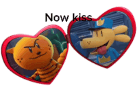 a pair of heart shaped sunglasses with a cat and a dog on them and the words now kiss