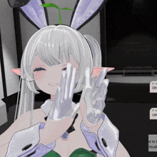 a girl with white hair and bunny ears is giving the peace sign