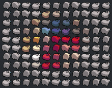 a bunch of sheep with different colors on their faces