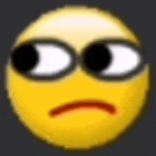 a close up of a yellow smiley face with black eyes and a red lip .