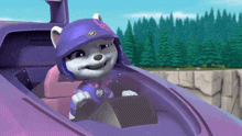 a cartoon character wearing a purple helmet is sitting in a purple vehicle