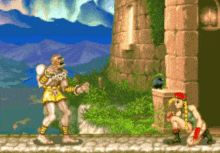 a man and a woman are fighting in a video game with mountains in the background