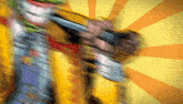 a blurred image of a cartoon character with a yellow and orange background