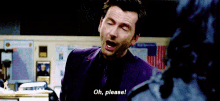 a man in a purple suit is making a funny face and says `` oh , please '' .