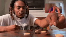Playing Checkers Young Rog GIF - Playing Checkers Young Rog On The Road GIFs