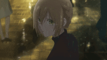 a close up of a girl 's face in the rain