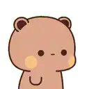 a brown teddy bear with a yellow spot on its face is looking at the camera on a white background .