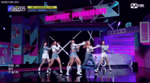 a group of girls are dancing in front of a sign that says secret number .