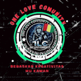 a one love community logo with a lion holding a flag in the center