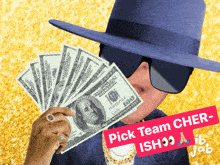 a man wearing a hat and sunglasses holds a fan of money
