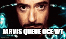 a close up of a man 's face with the words jarvis queue oce wt