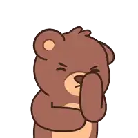 a brown teddy bear is making a funny face