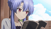 a girl with purple hair is reading a book with chinese writing