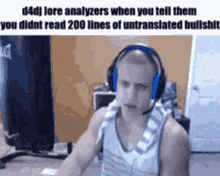 a man wearing headphones is sitting in front of a punching bag