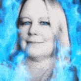 a close up of a woman 's face with a blue background .