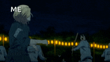 a man in a blue shirt is holding a stick in the air while another man is laying on the ground .