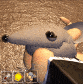 a computer generated image of a rat with a yellow item in the lower right corner