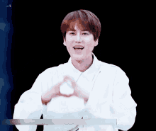 Super Junior Kyuhyun GIF - Super Junior Kyuhyun Hearts GIFs