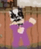 a blurry picture of a person wearing a purple shirt and a mask