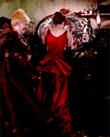 satine moulin pose red dress pretty