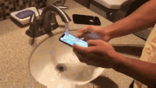 Iphone Wash GIF - Iphone Wash Sink GIFs