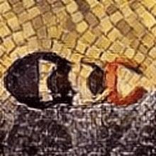 a close up of a mosaic of a person laying on a bed with a brick wall in the background .