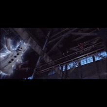 a ghost is flying through the air in a dark building