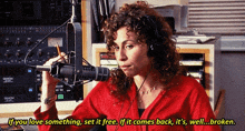 a woman wearing headphones is talking into a microphone with the words if you love something set it free written below her
