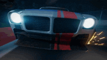 a car with a red white and blue strip on the front
