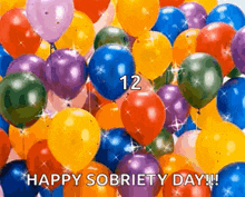 a bunch of colorful balloons are flying in the air with the words `` happy sobriety day ! ''