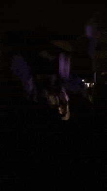 a blurry picture of a man in a black shirt that says ' i love you '
