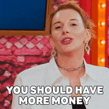a woman says " you should have more money " while wearing earrings