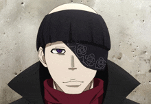 a man with a bandana on his eye and a bald head