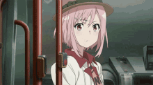 a girl with pink hair is wearing a hat and a shirt that says nm
