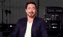 Tony Stark Face Palm GIF - Tony Stark Face Palm Smile GIFs